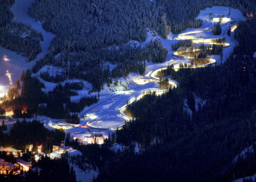 Lights glow around the Whistler Sliding Center track.  It's nearly a mile long, drops 499...
