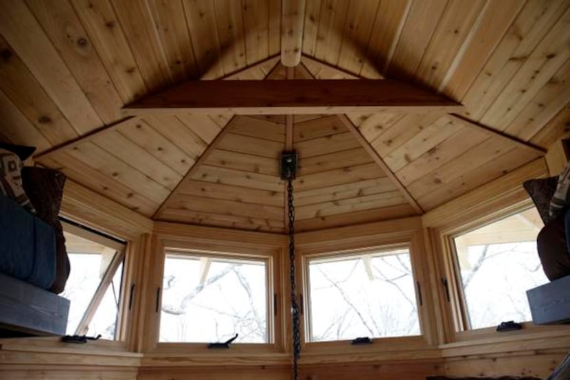 
A view of the upstairs area in a treehouse built by Pete Nelson for Bobby and Marty Page in...