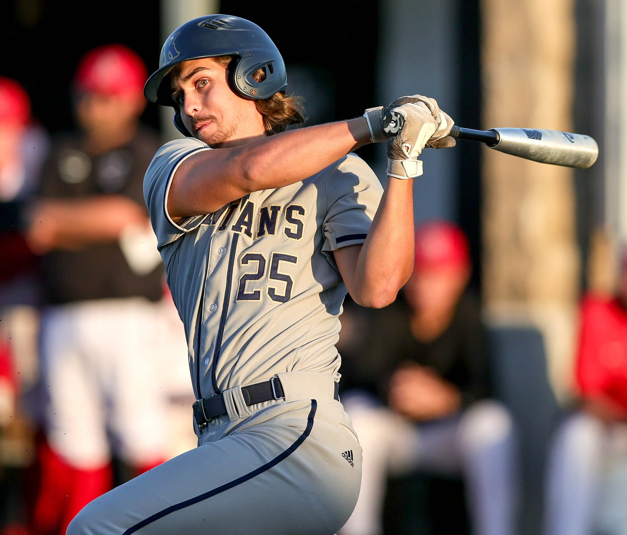 Keller DH Niko Pecskovszky takes a big swing against Flower Mound Marcus during game 1 of...