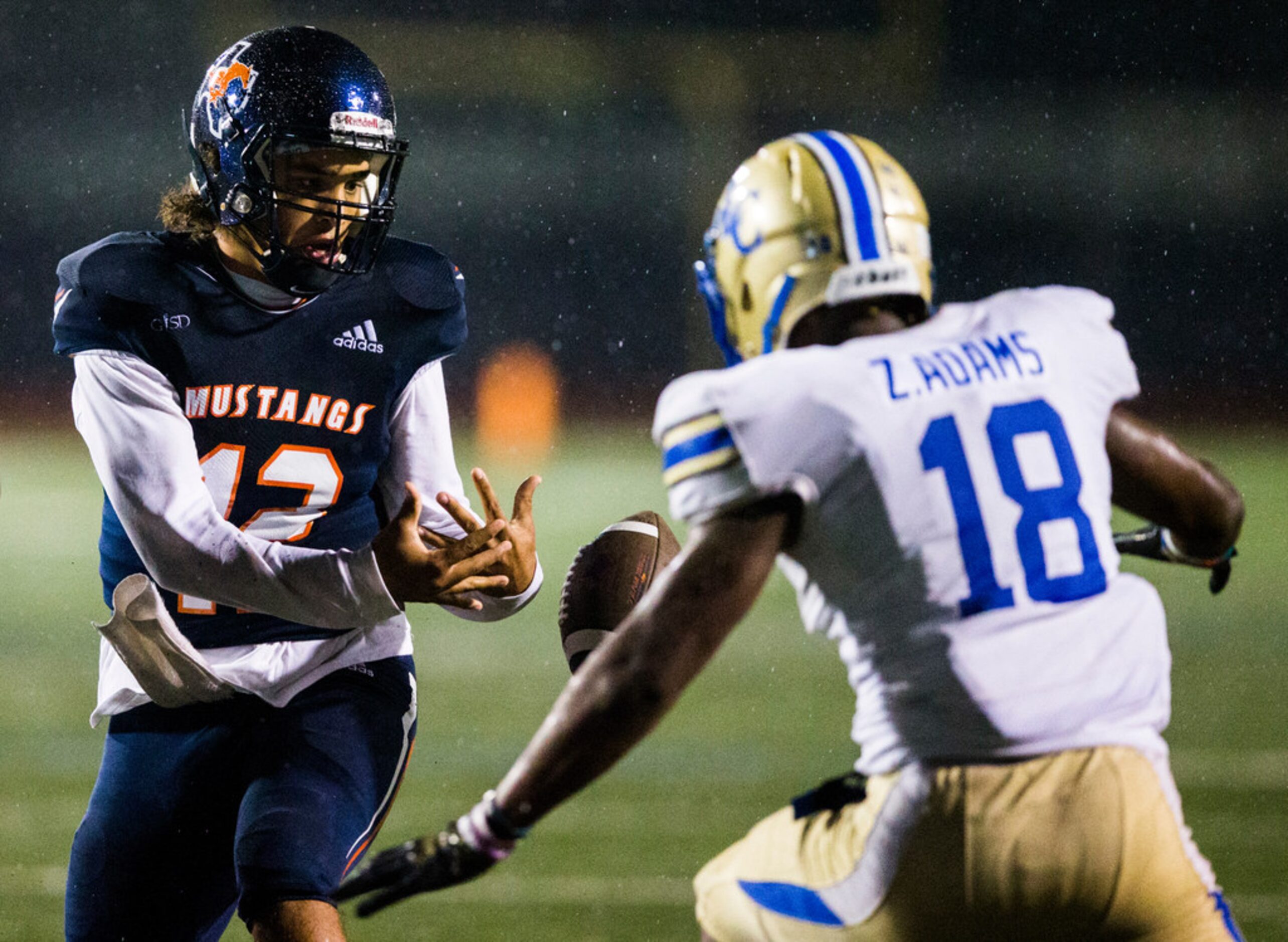 Sachse quarterback Xavier Forman (12) fumbles a snap that was recovered by Garland Lakeview...