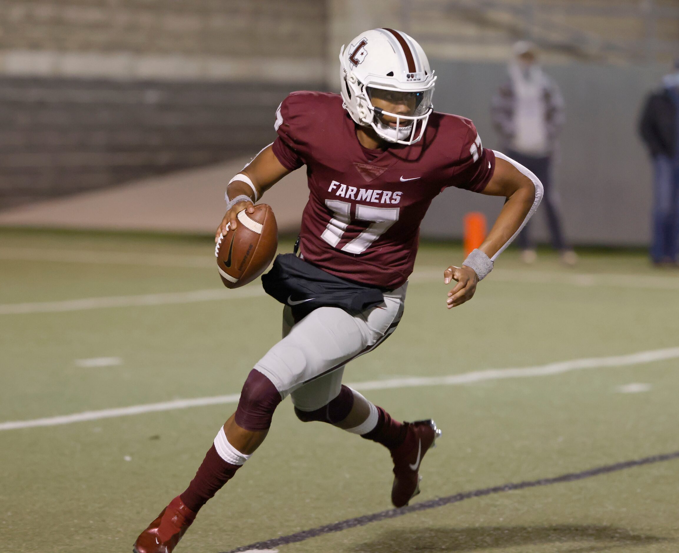 Lewisville quarterback Taylen Green (17) looks to pass against Arlington Martin during Class...