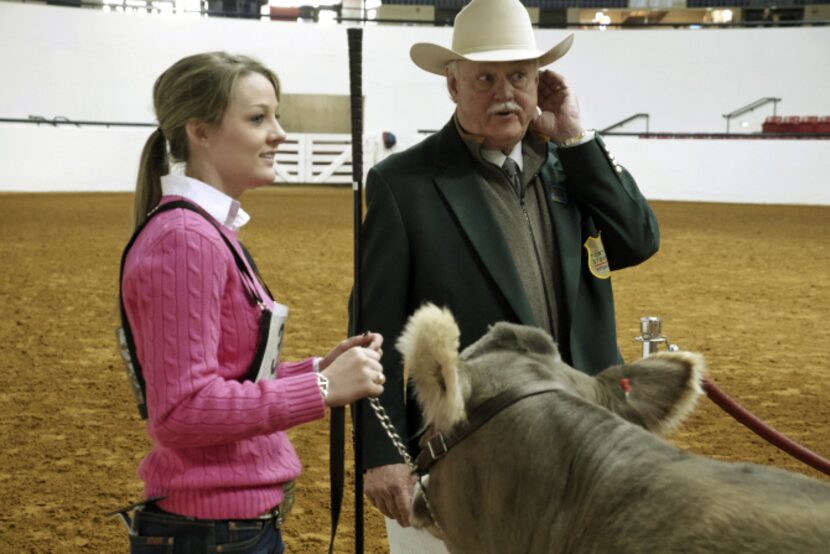 Jessica Johnston with the Broken Oak Ranch out of Seguin and Livestock Superintendent Mike...