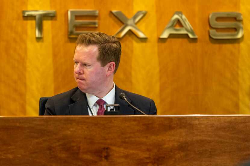 Public Utility Commission of Texas chairman Peter Lake listened to testimony at a meeting in...