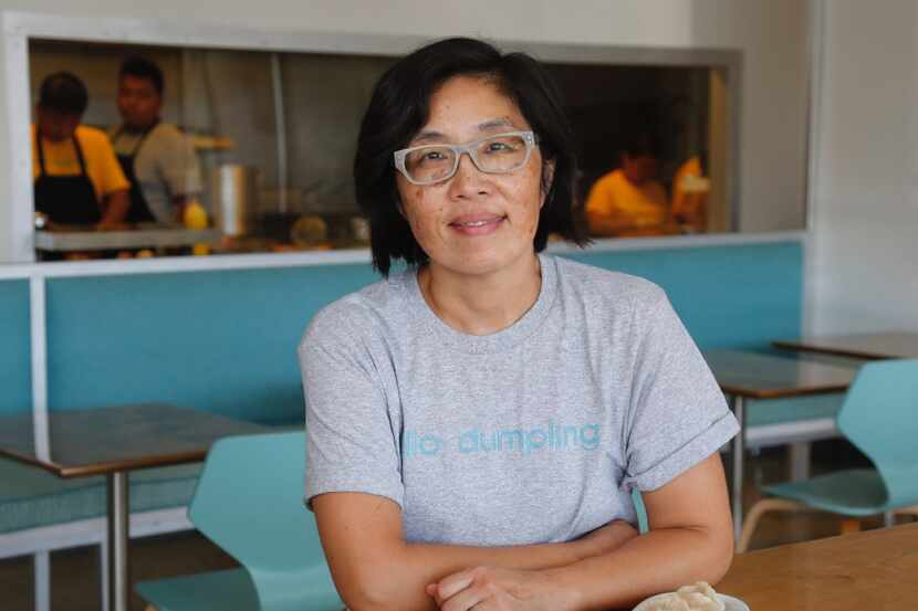 Hello Dumpling owner June Chow, photographed with the pan fried beef dumplings and steamed fish