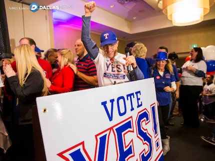 Campaign co-chair Kelly Curnutt and other supporters of a proposed new stadium for the Texas...