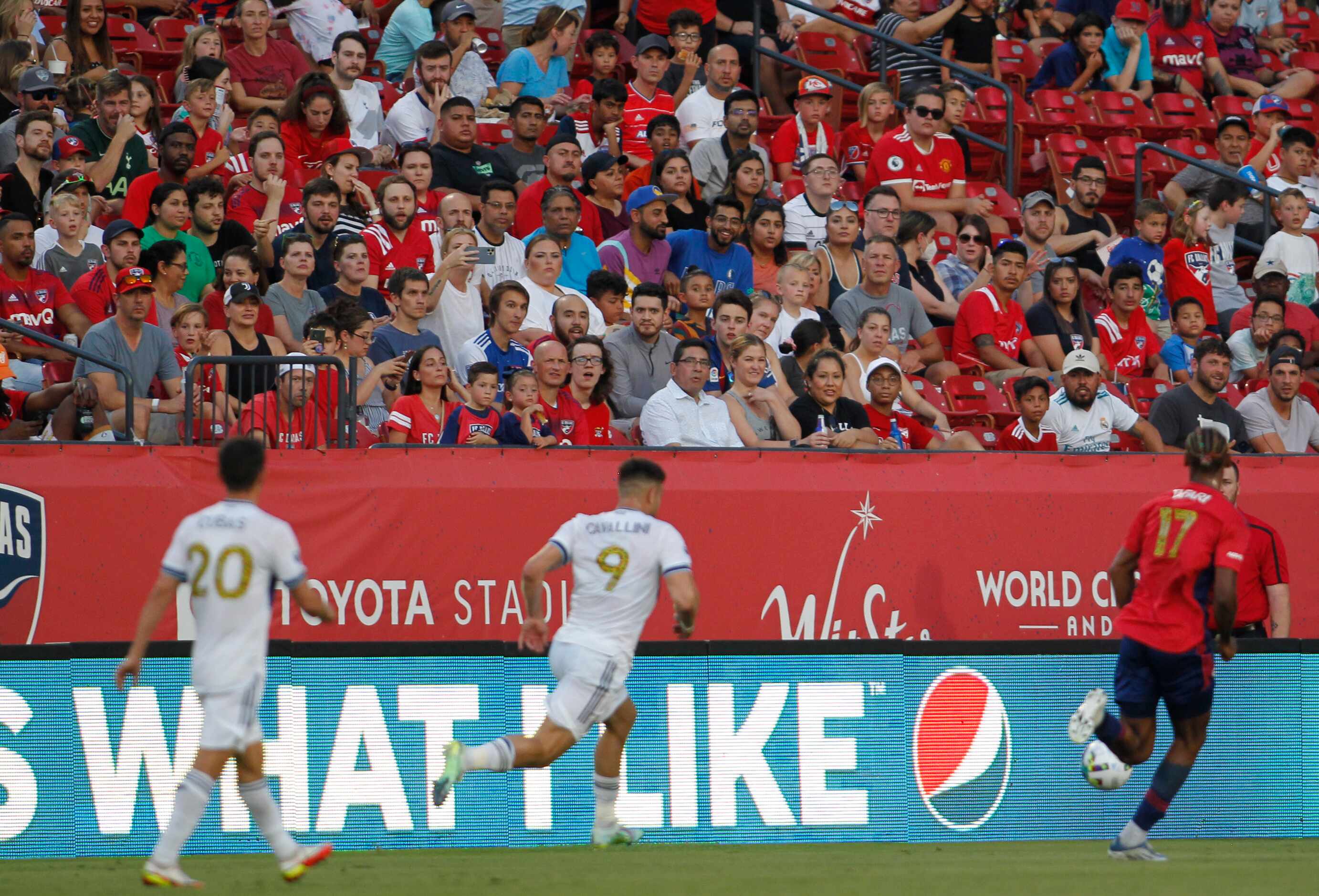 Fans look on during first half action as FC Dallas hosted Vancouver Whitecaps. The two teams...