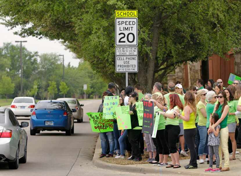 
Parents and others rallied against bullying across the street from McKinney Boyd High...