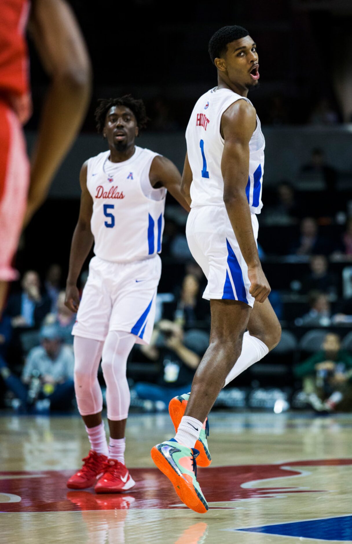 Southern Methodist Mustangs forward Feron Hunt (1) reacts after dunking the ball during the...