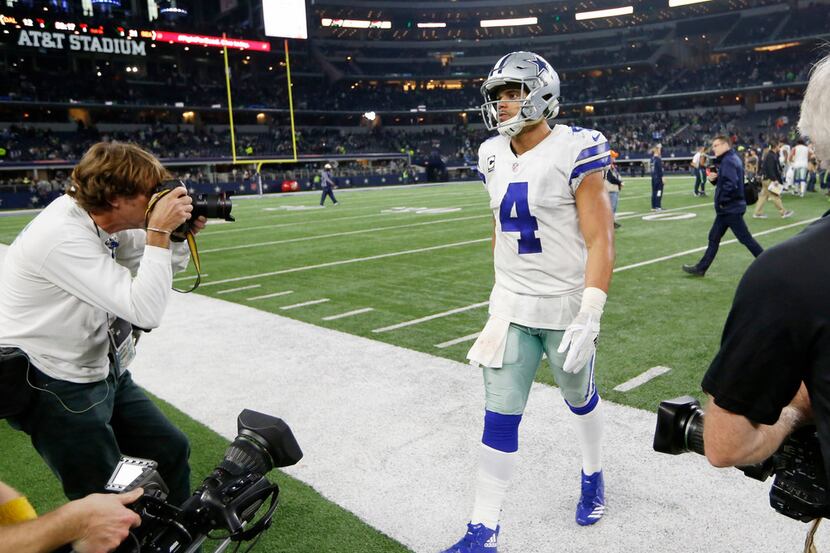 Dallas Cowboys quarterback Dak Prescott (4) exits the field after losing to the Seattle...