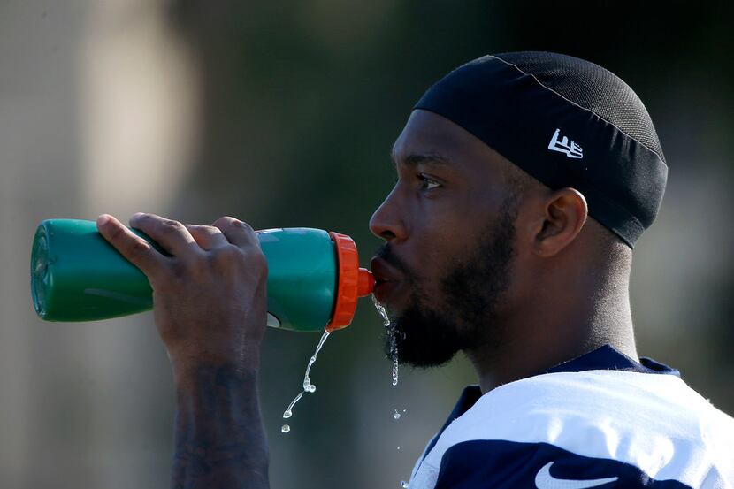 Dallas Cowboys wide receiver Tavon Austin gets some water during the afternoon practice at...