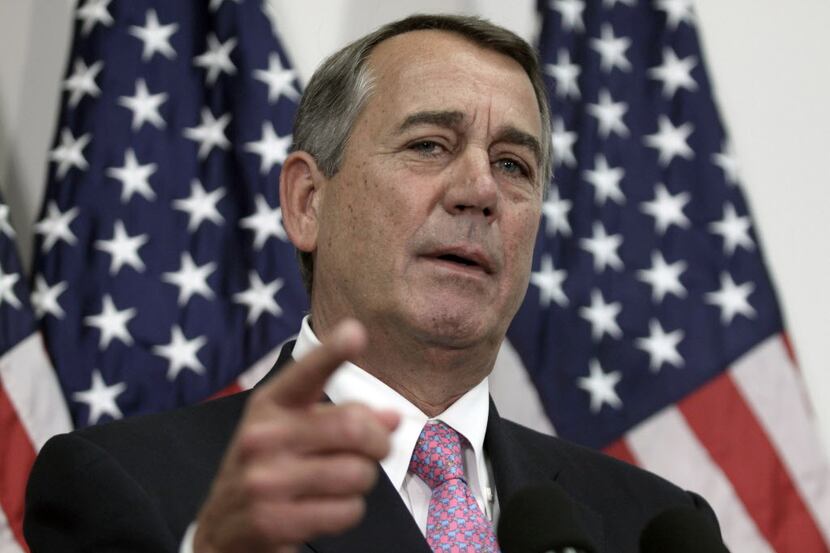  Outgoing House Speaker John Boehner of Ohio talks with reporters on Capitol Hill on...