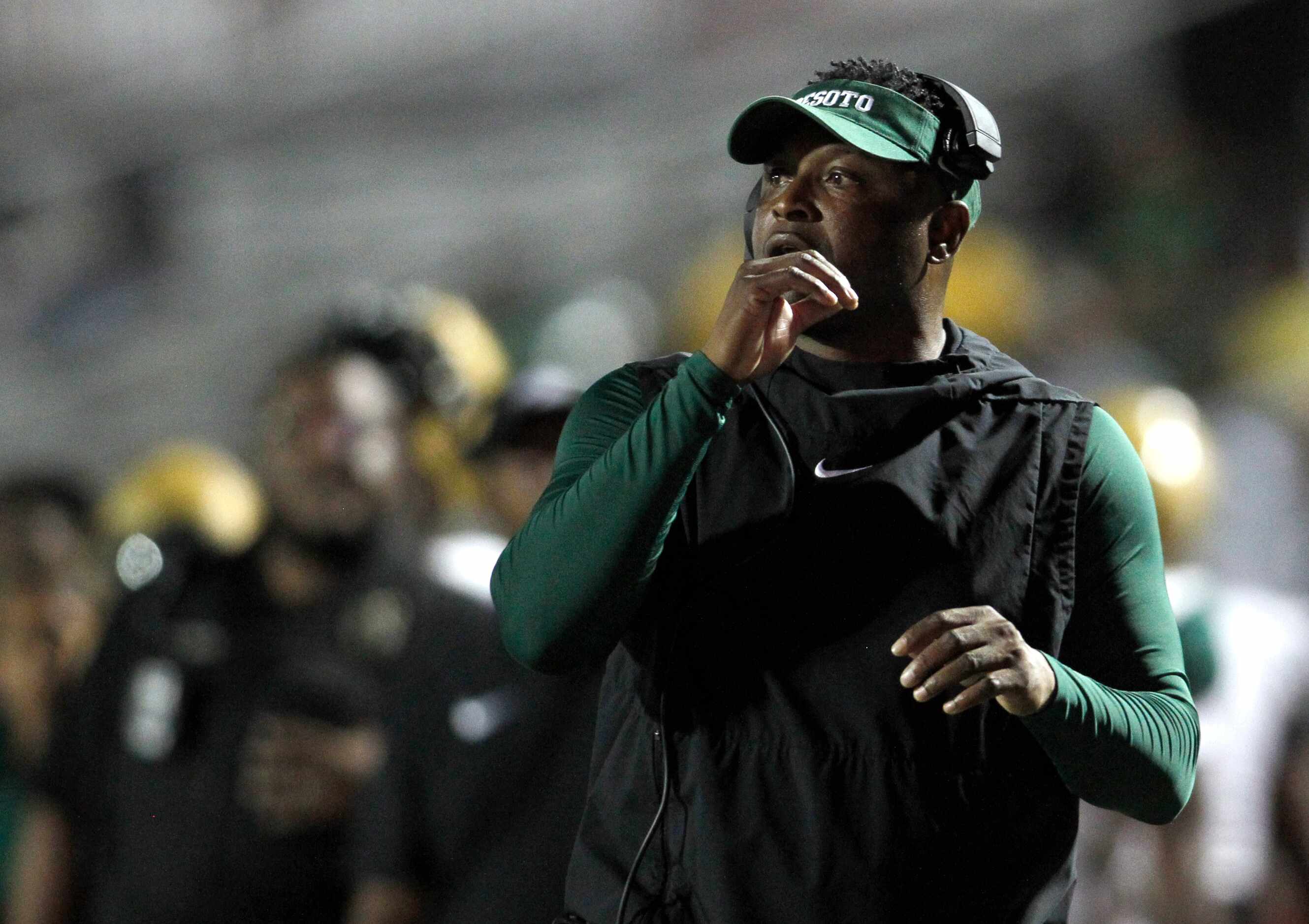 DeSoto head coach Claude Mathis watches intently during first quarter action of the DeSoto...