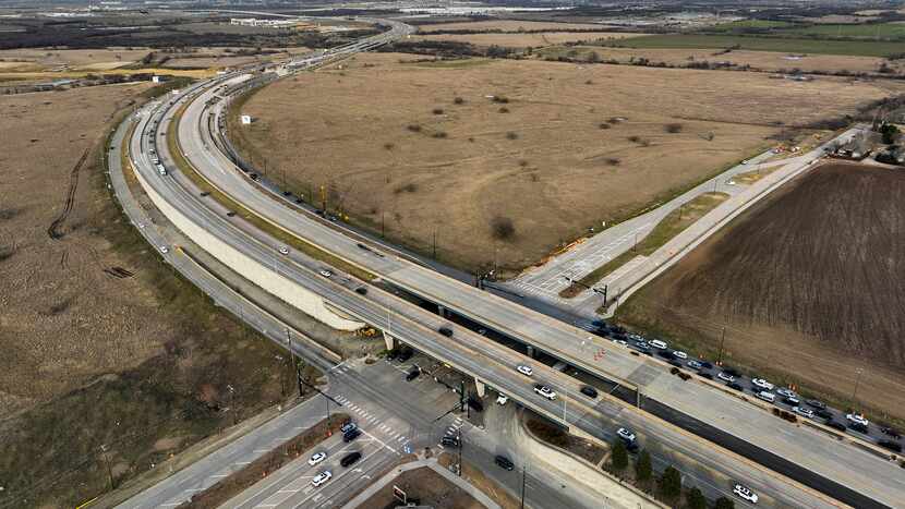 Aerial view of the corner of the Dallas North Tollway at Panther Creek Parkway in the Fields...