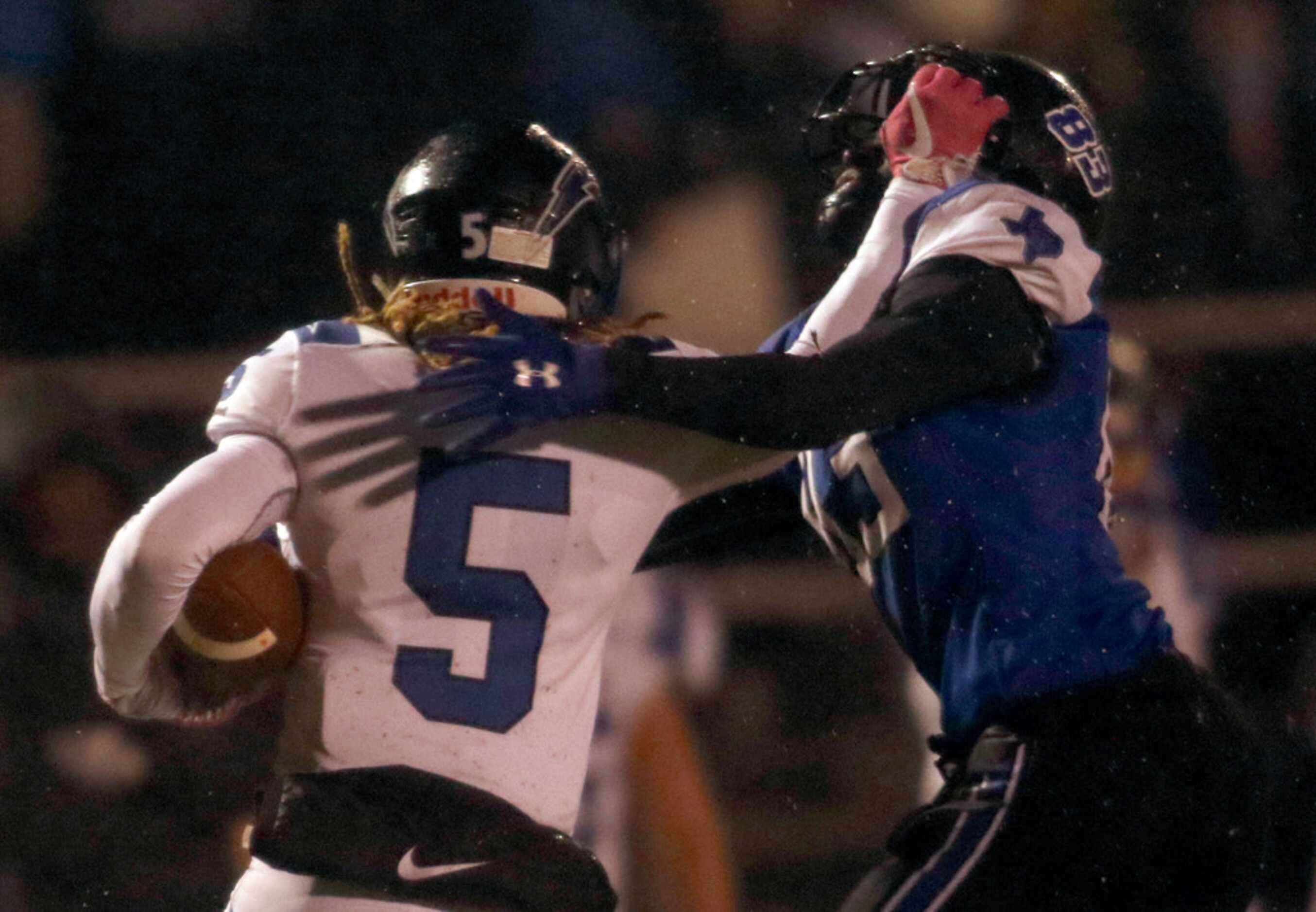 Dallas Christian kick returner Peyton Veasley (5) was flagged for a facemark penalty against...