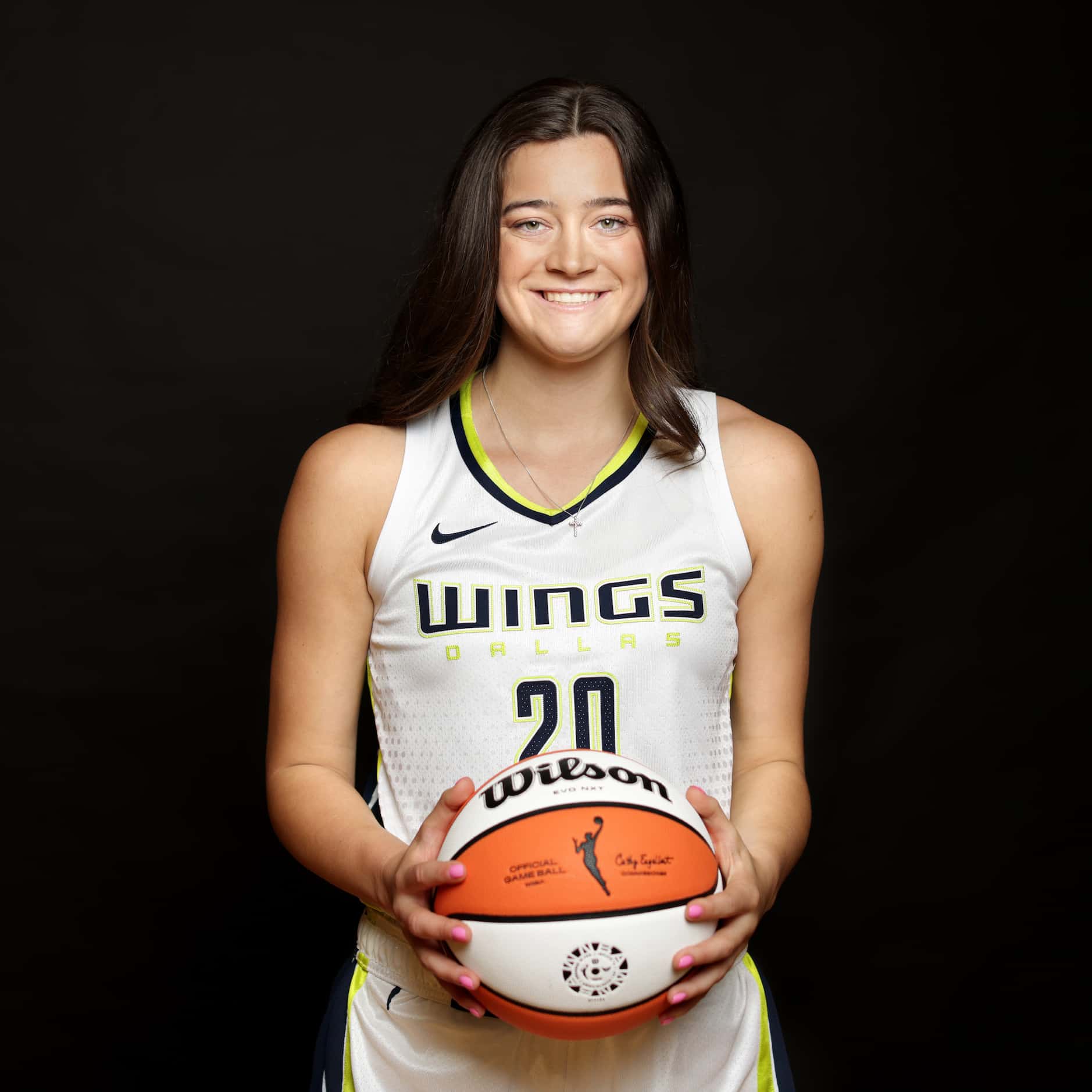 #20 Maddy Siegrist with The Dallas Wings poses for a photograph at College Park Center in...