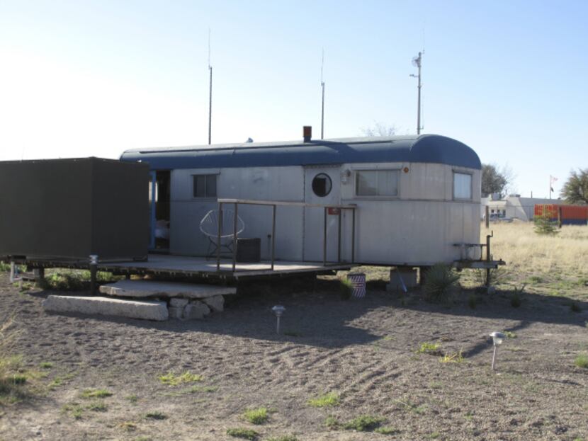 The Branstrator is a 1950s-era trailer at El Cosmico in Marfa. The area on the porch at left...