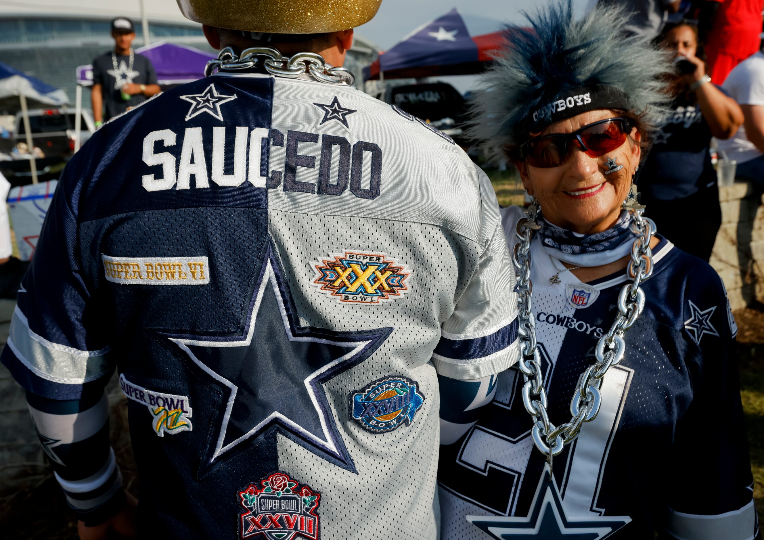 Irma Saucedo (left) of San Antonio poses with son Stephen Saucedo before the start of the...