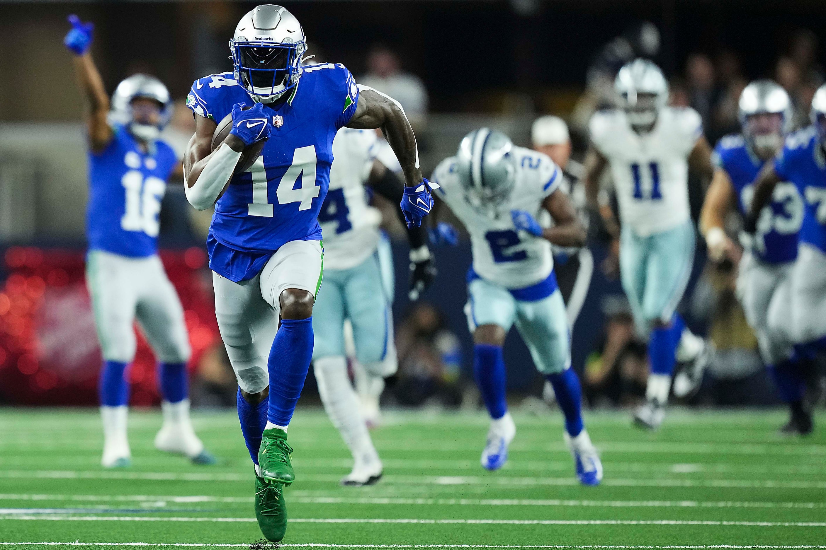 Seattle Seahawks wide receiver DK Metcalf (14) races for the end zone on a 73-yard touchdown...