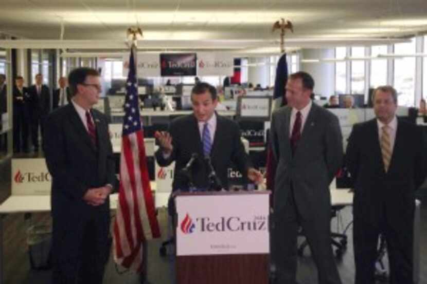 U.S. Sen. Ted Cruz, center, discusses the support from Lt. Gov. Dan Patrick, left, and...