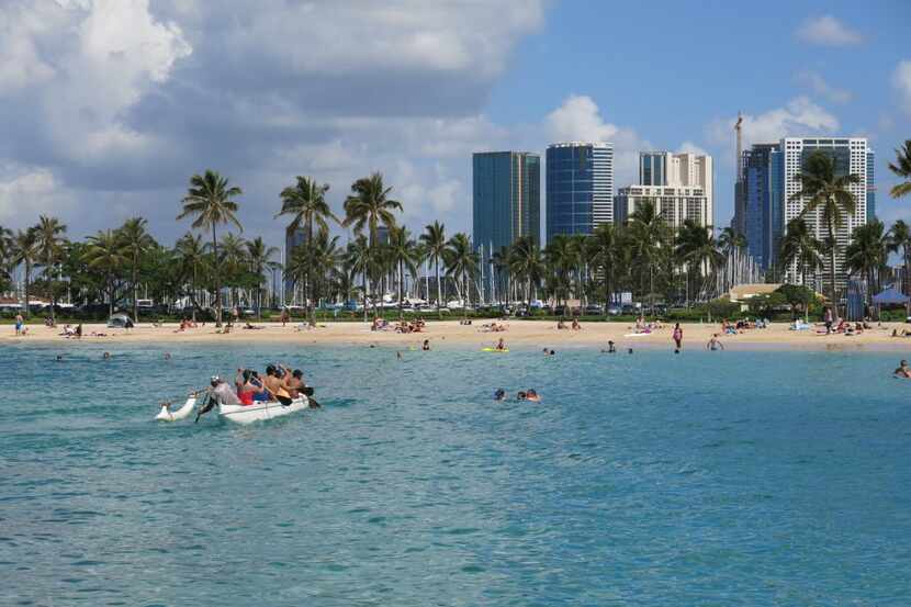 Duke Kahanamoku Beach in the Honolulu tourist neighborhood of Waikiki in Hawaii is...