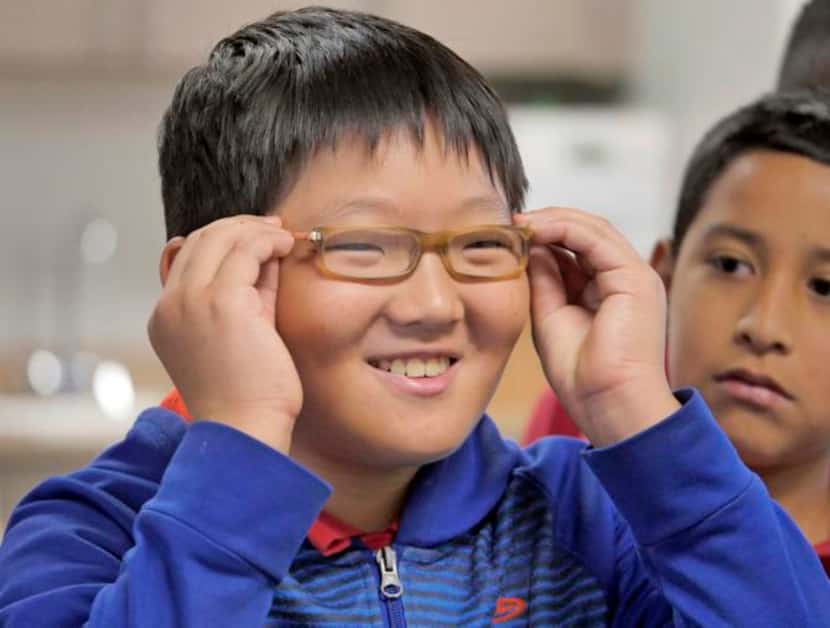 
La Villita Elementary School student Jay Lee, 10, had his vision tested by the Essilor...