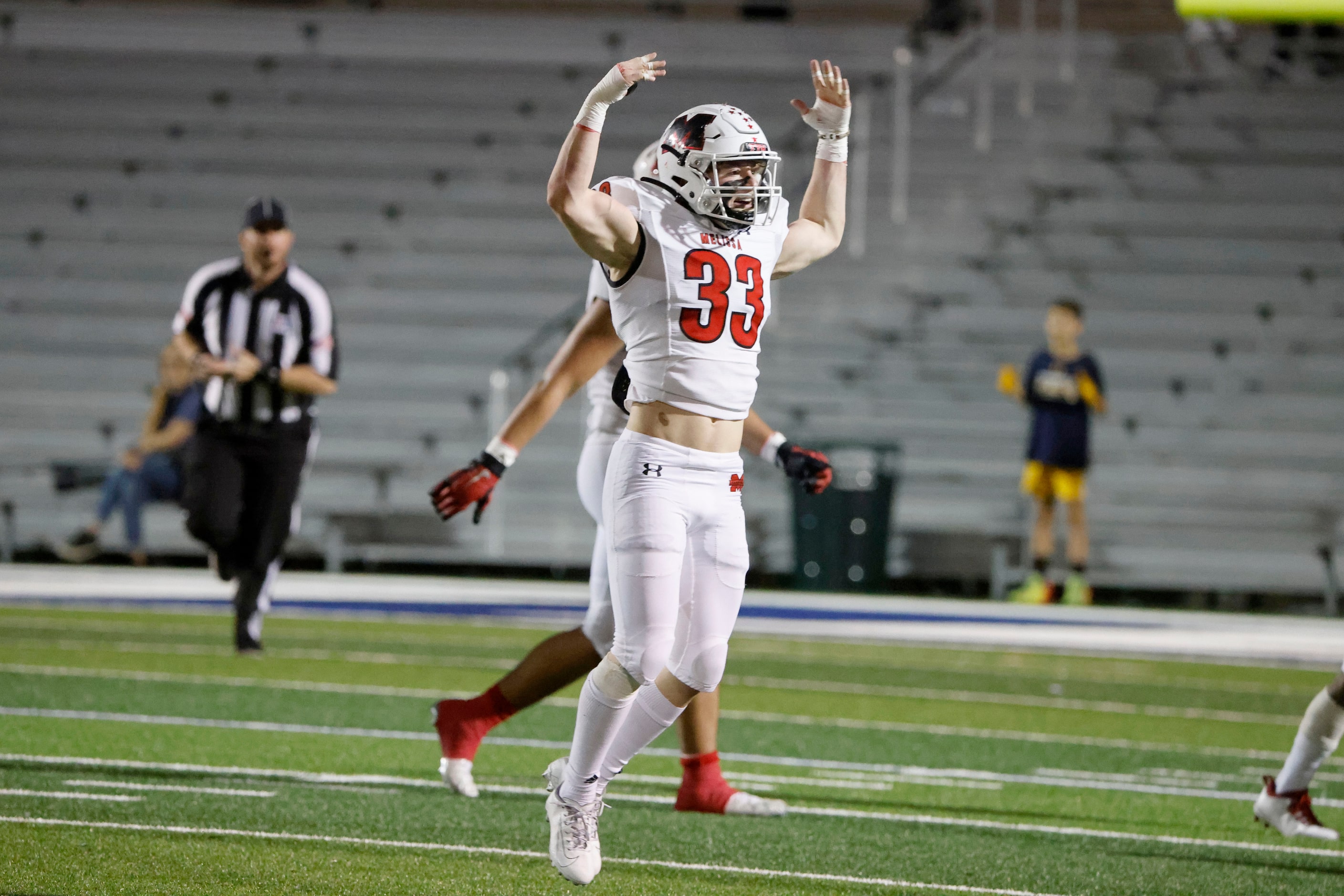 Melissa linebacker Jayson Cave (33) celebrates as they got the ball on downs from...