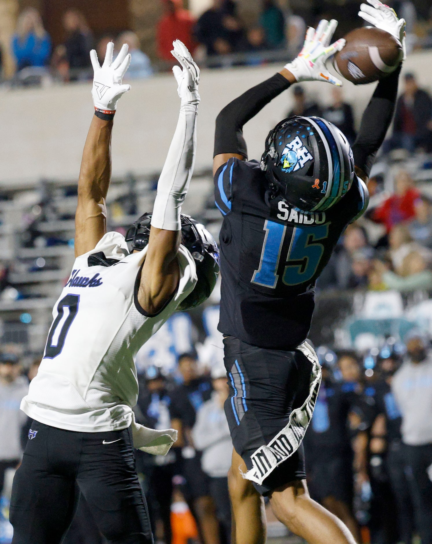 Rock Hill's Dominic Saidu (15) fails to make the catch against Hebron's Gabriel White (0) in...