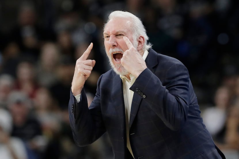 San Antonio Spurs head coach Gregg Popovich argues a call with an official during the first...