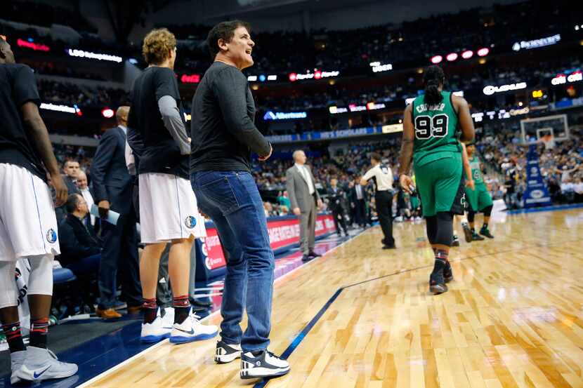 Dallas Mavericks owner Mark Cuban reacts to a double technical and ejection being assessed...