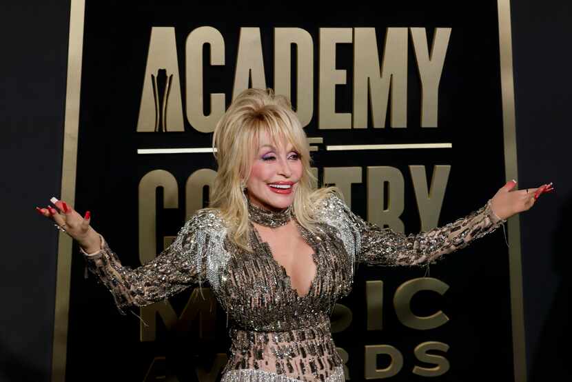 Dolly Parton arrives for the red carpet during the 58th Academy of Country Music Awards on...