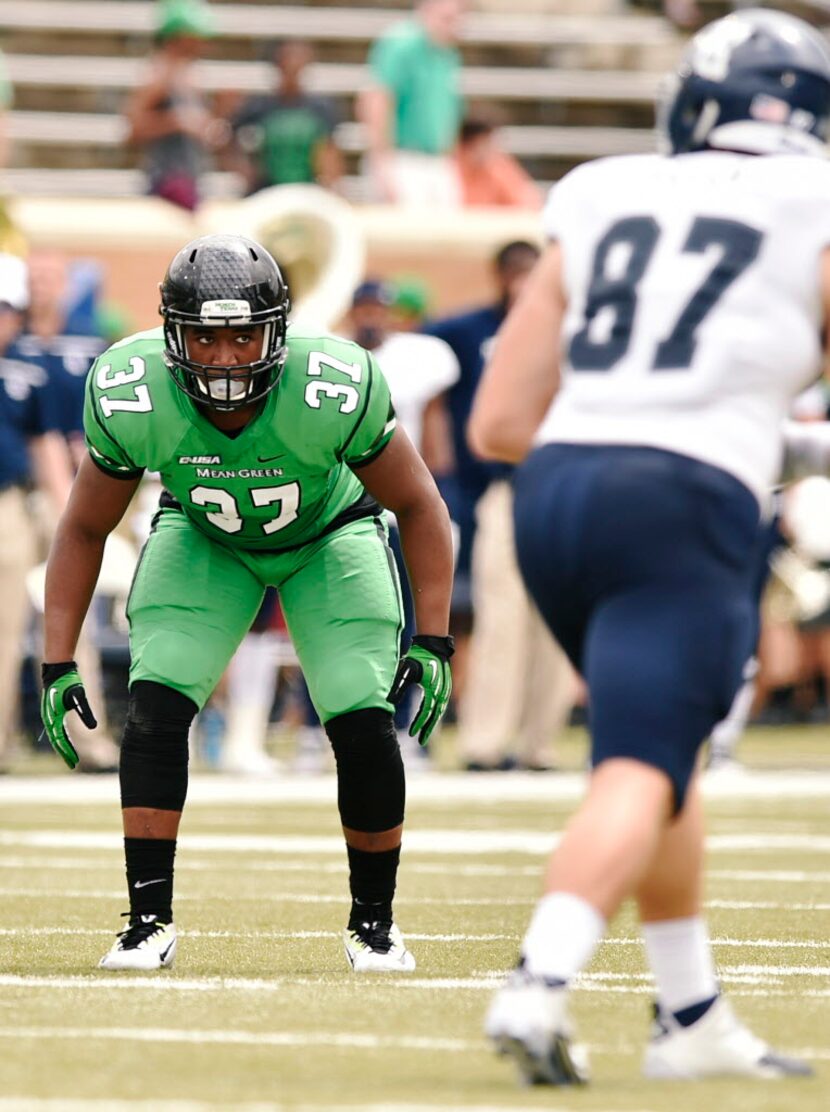 North Texas freshman linebacker Brandon Garner (37) lines up against Rice, Saturday,...