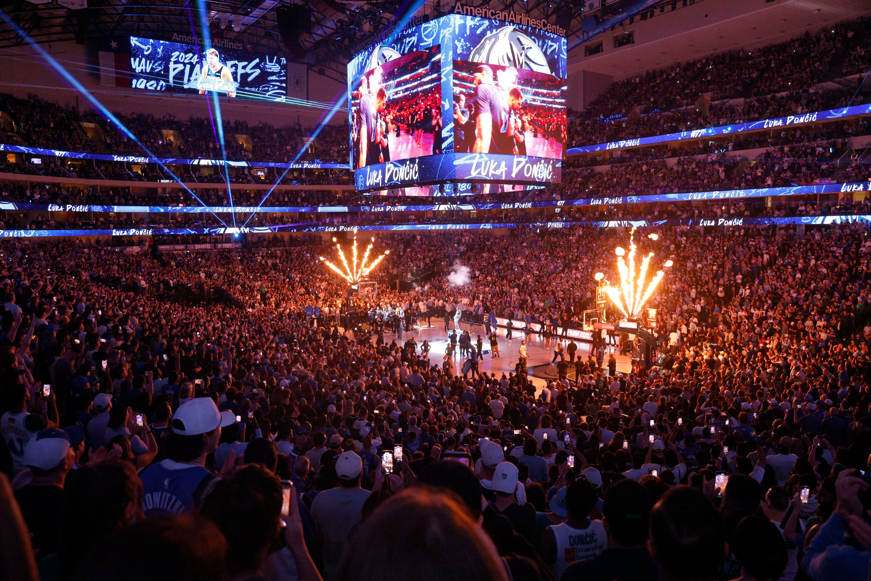 Fans watch as Dallas Mavericks guard Luka Doncic is introduced before Game 6 of an NBA...