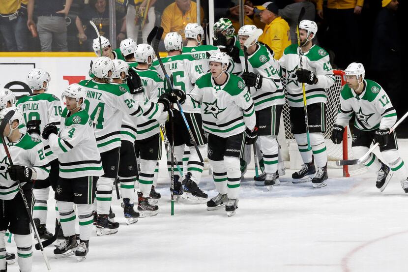 The Dallas Stars celebrate after defeating the Nashville Predators 3-2 in Game 1 of an NHL...