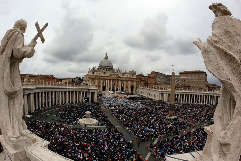 Faithful fill St. Peter's Square at the Vatican, Sunday, April 27, 2014.  Pope Francis has...