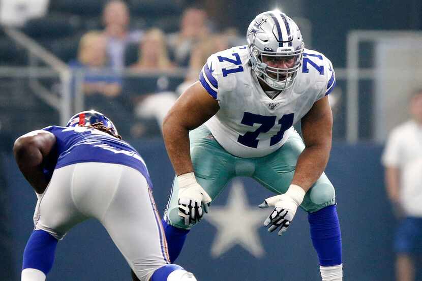 FILE - Cowboys right tackle La'el Collins (71) is pictured during a game against the New...