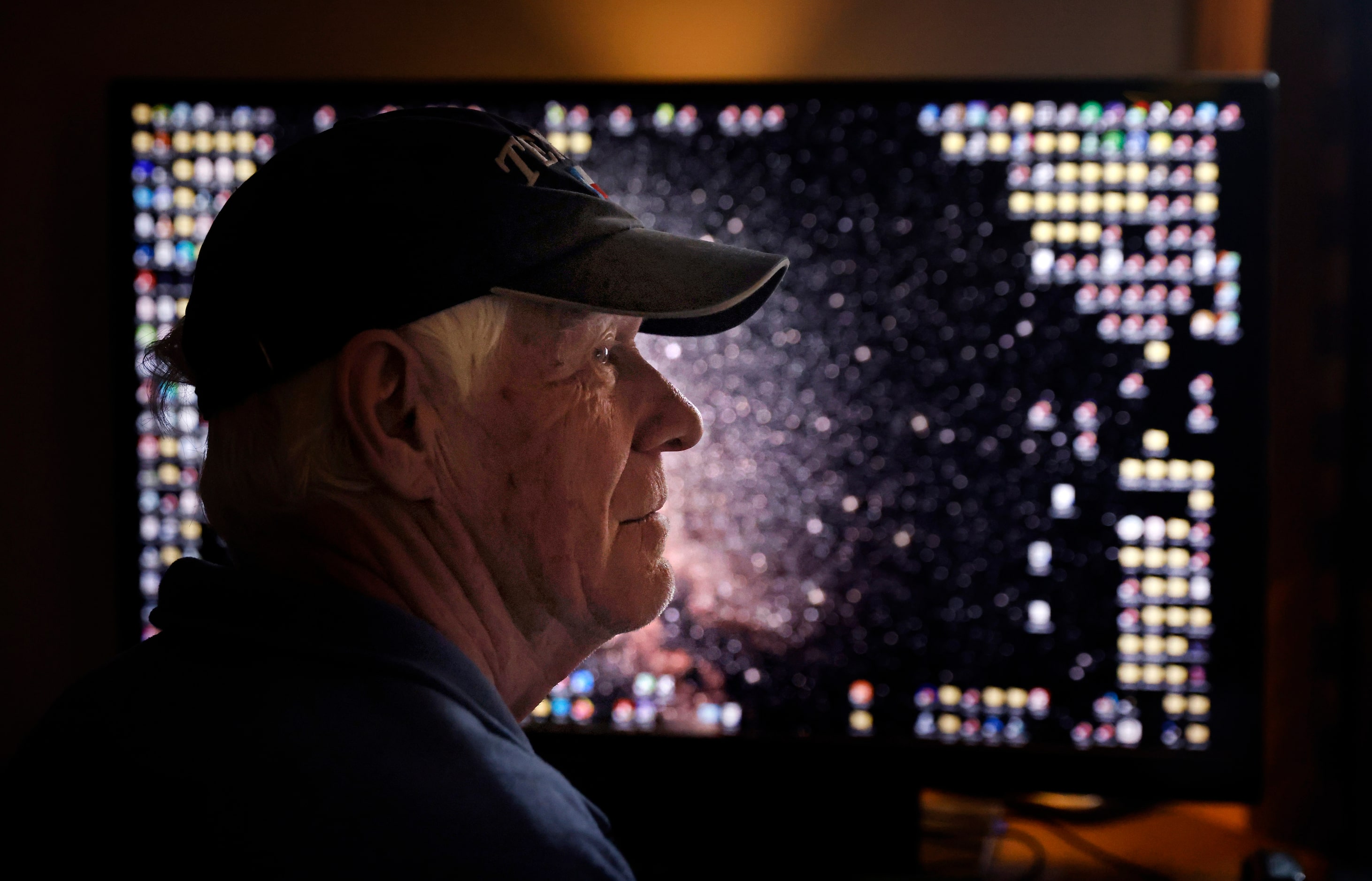 Astrophotographer Peter Armstrong ,78, who is legally blind, sometimes has to view files and...