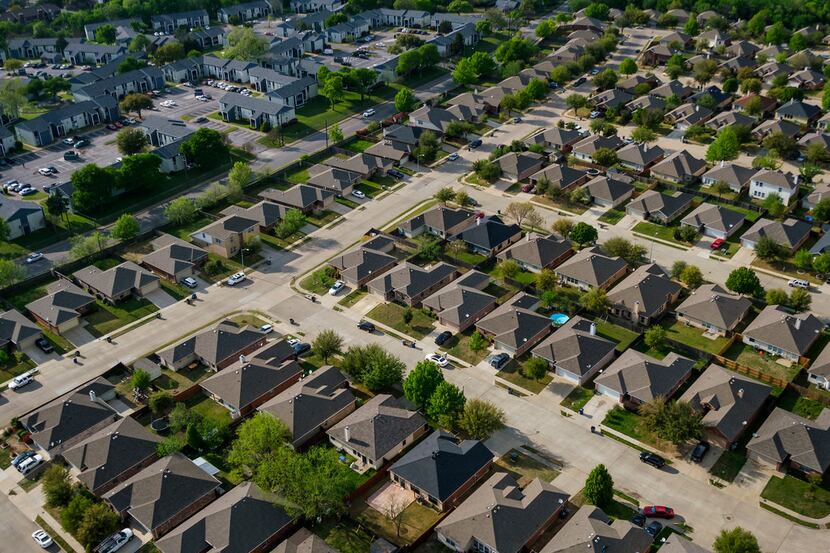 Aerial view of houses and apartments in the Red Bird area on April 4, 2019, in Dallas....