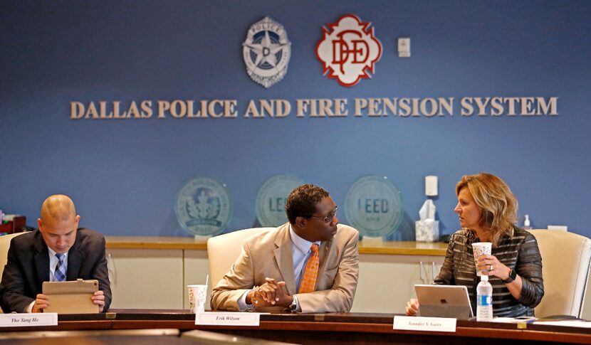 City Council member Erik Wilson (center) talks with City Council Jennifer Staubach Gates...