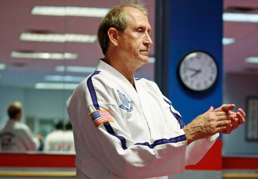 
Grand Master Scott McNeely, director of the Plano Sports Authority Martial Arts Academy,...