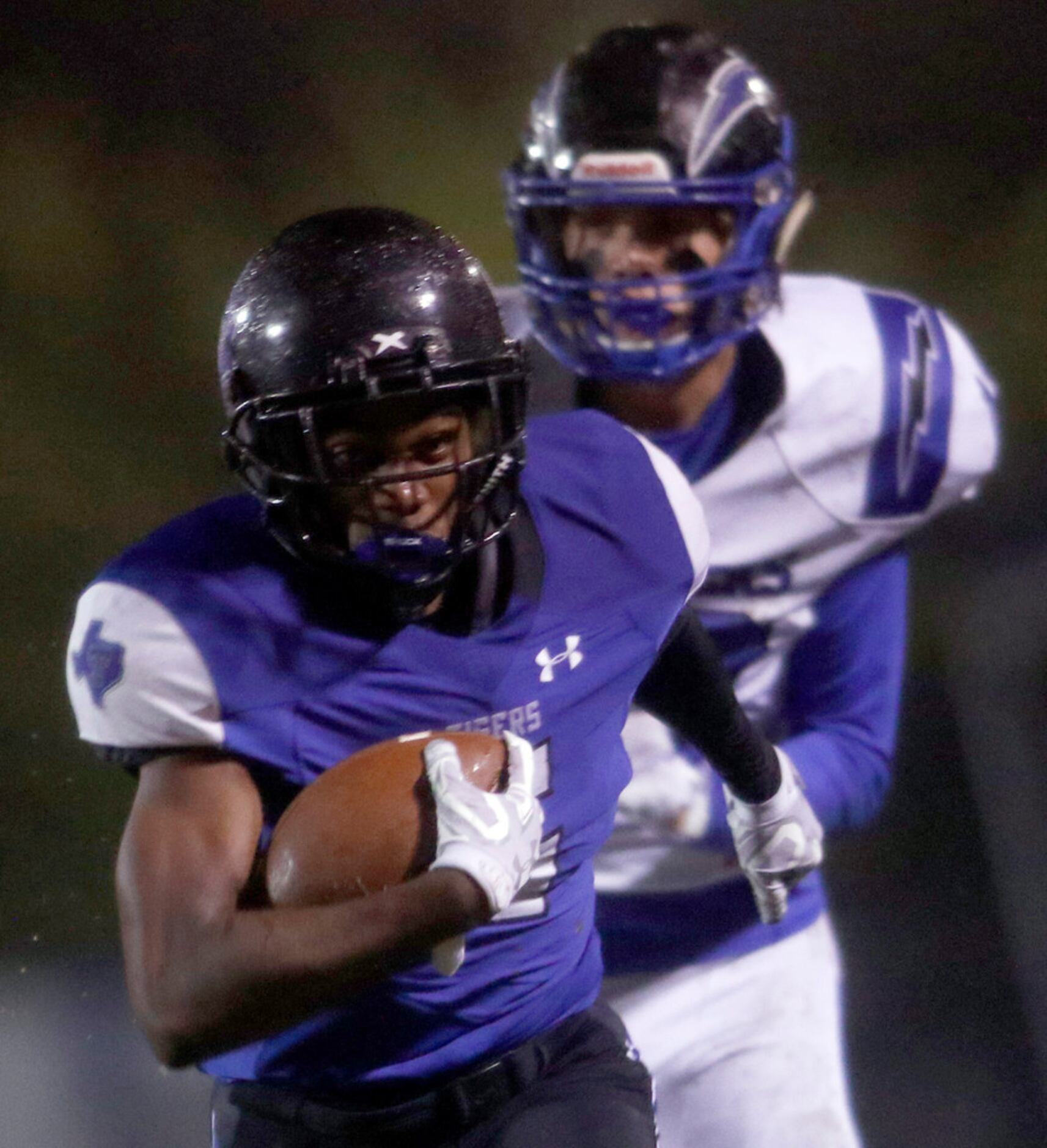 Trinity Christian-Cedar Hill receiver Cameron Wilson (6) sprints to the end zone past the...