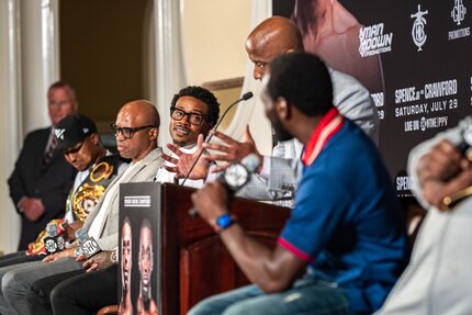 DeSoto's Errol Spence Jr. looks on as Terence Crawford speaks during a press conference...