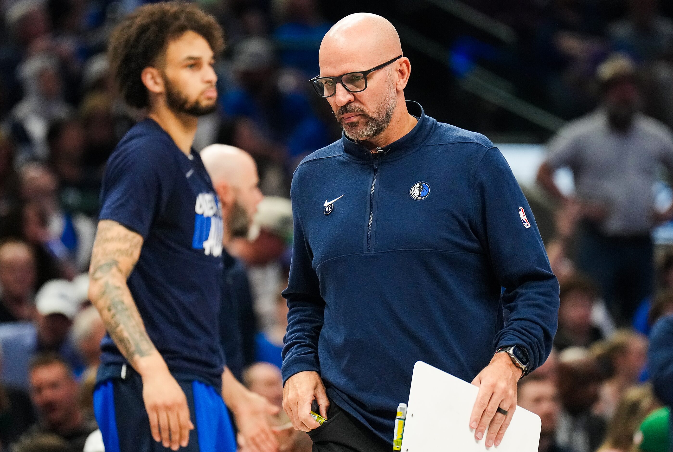 Dallas Mavericks head coach Jason Kiddd calls a timeout during the first half of Game 4 of...