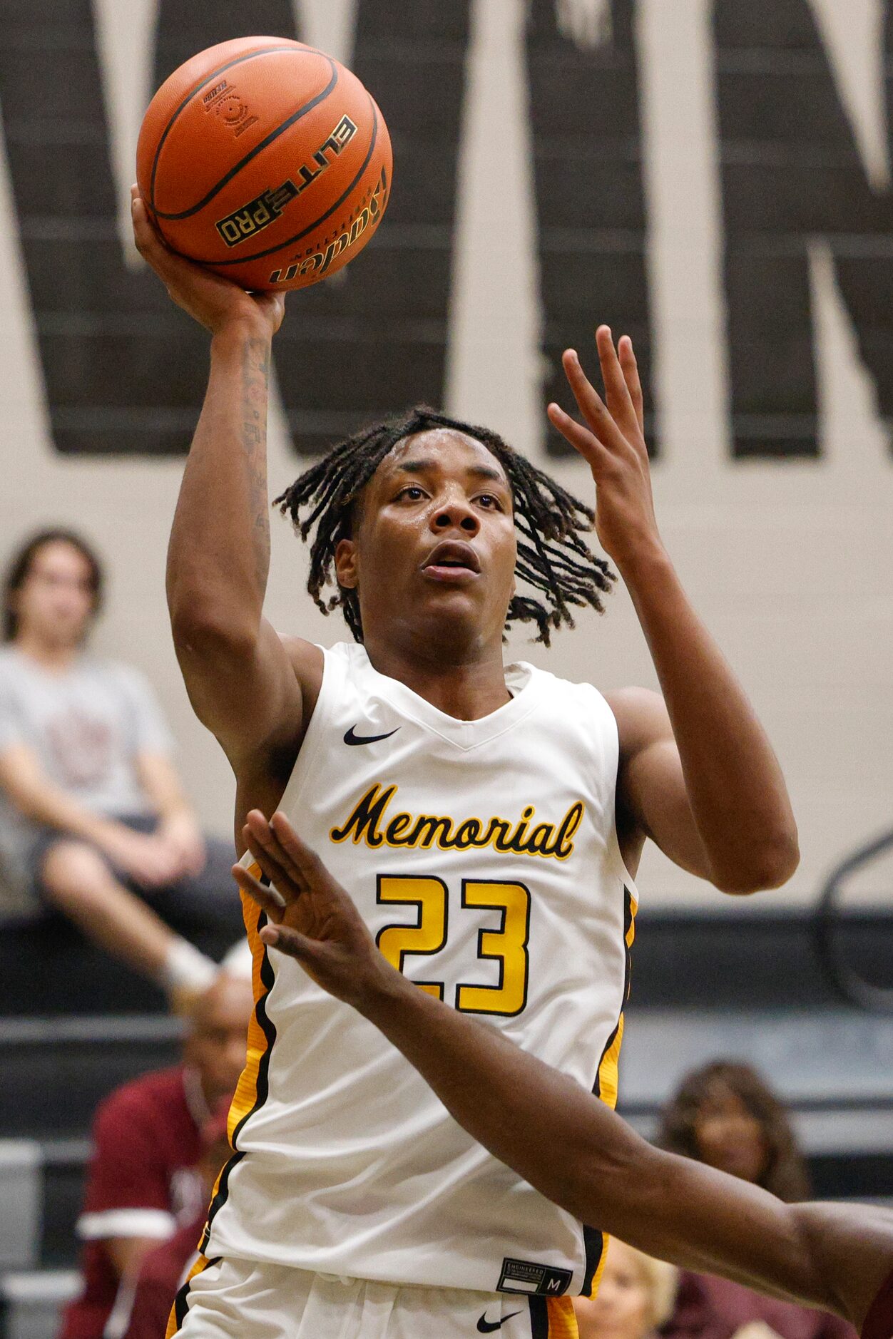 Frisco Memorial forward Leon Horner (23) shoots the ball during the first half of a...