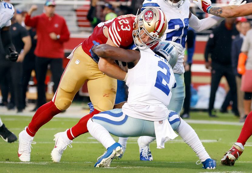 Dallas Cowboys cornerback Jourdan Lewis (2) strips the ball from San Francisco 49ers running...
