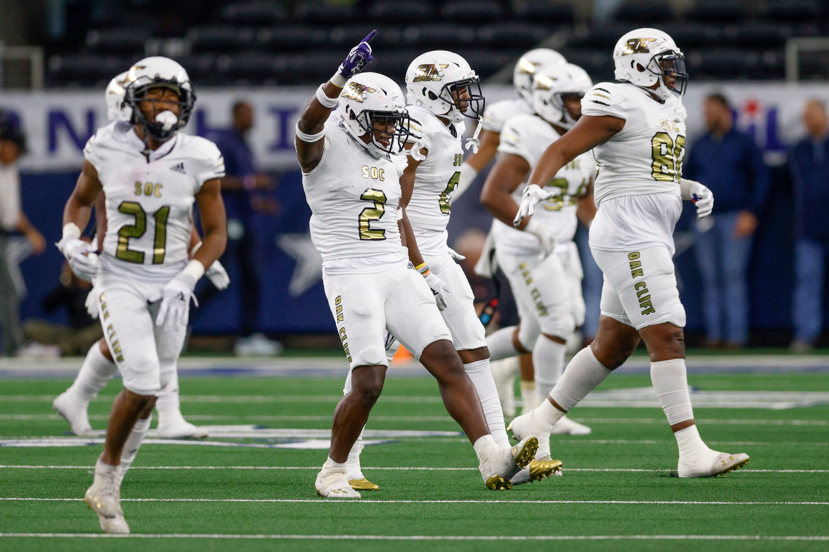 South Oak Cliff defensive back Kyron Chambers (2) celebrates a turnover on downs during the...