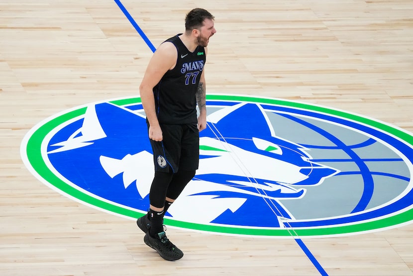 Dallas Mavericks guard Luka Doncic celebrates after hitting a game-winning 3-pointer over...