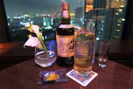 At TwentyEight, the stylish 28th-floor bar at the posh Conrad Tokyo, highballs are served...