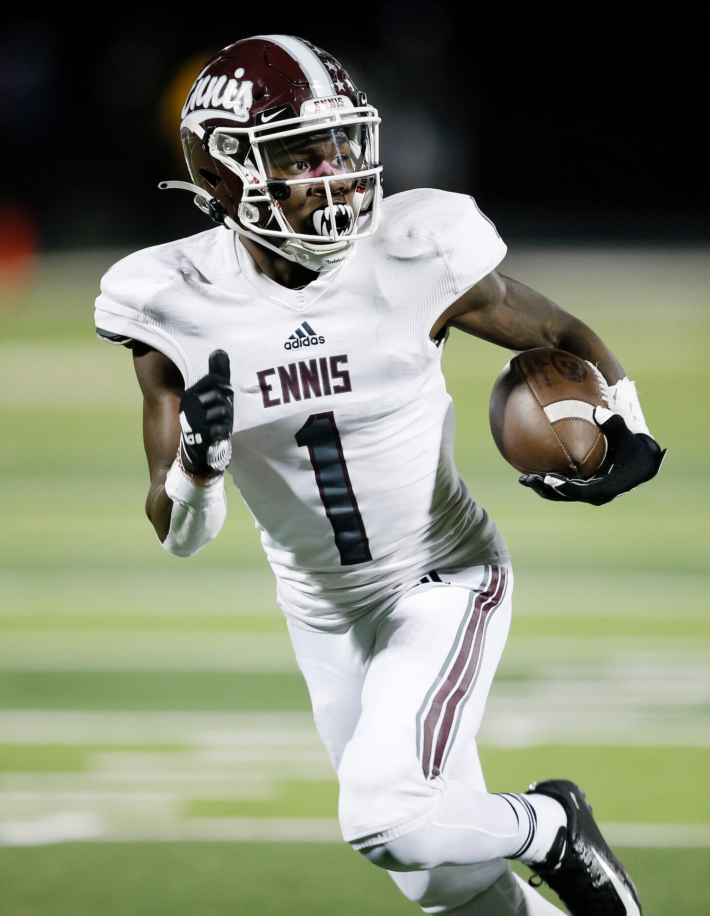 Ennis senior wide receiver Karon Smith (1) runs a pass in for a touchdown during the second...