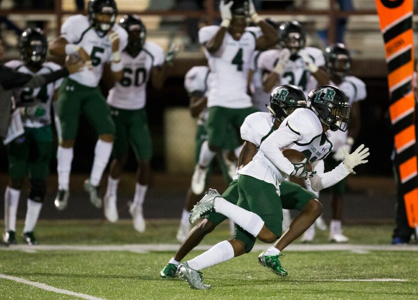 Lake Ridge Eagles Addison McCarther (22) intercepts the pass intended for Red Oak Eagles...