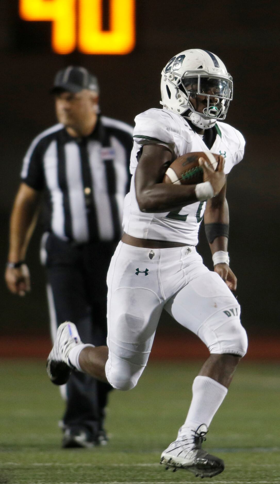 Prosper running back JT Lane (28) scampers to the end zone enroute to a 69-yard rushing...